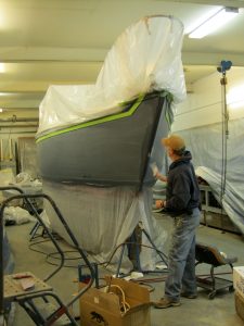 sanding-front-of-boat